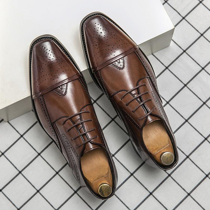 Brown low-top leather lace-up shoes with perforated toe and metal eyelets