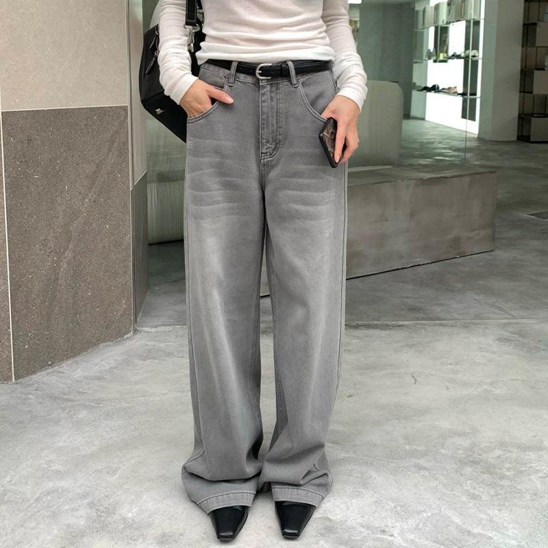 Gray wide-leg trousers with belt loops, button closure, and front slash pockets