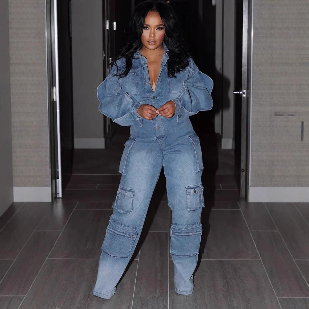 Blue denim jumpsuit with draped sleeves, V-neck, and straight cargo legs.