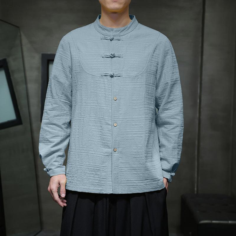 Men’s cotton-linen Chinese Tang shirt, light blue, stand collar with frog buttons, long sleeves.