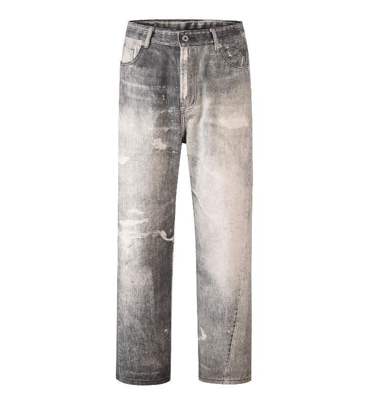 Gray wash jeans with button-front, belt loops, and distressed knee and thigh spots
