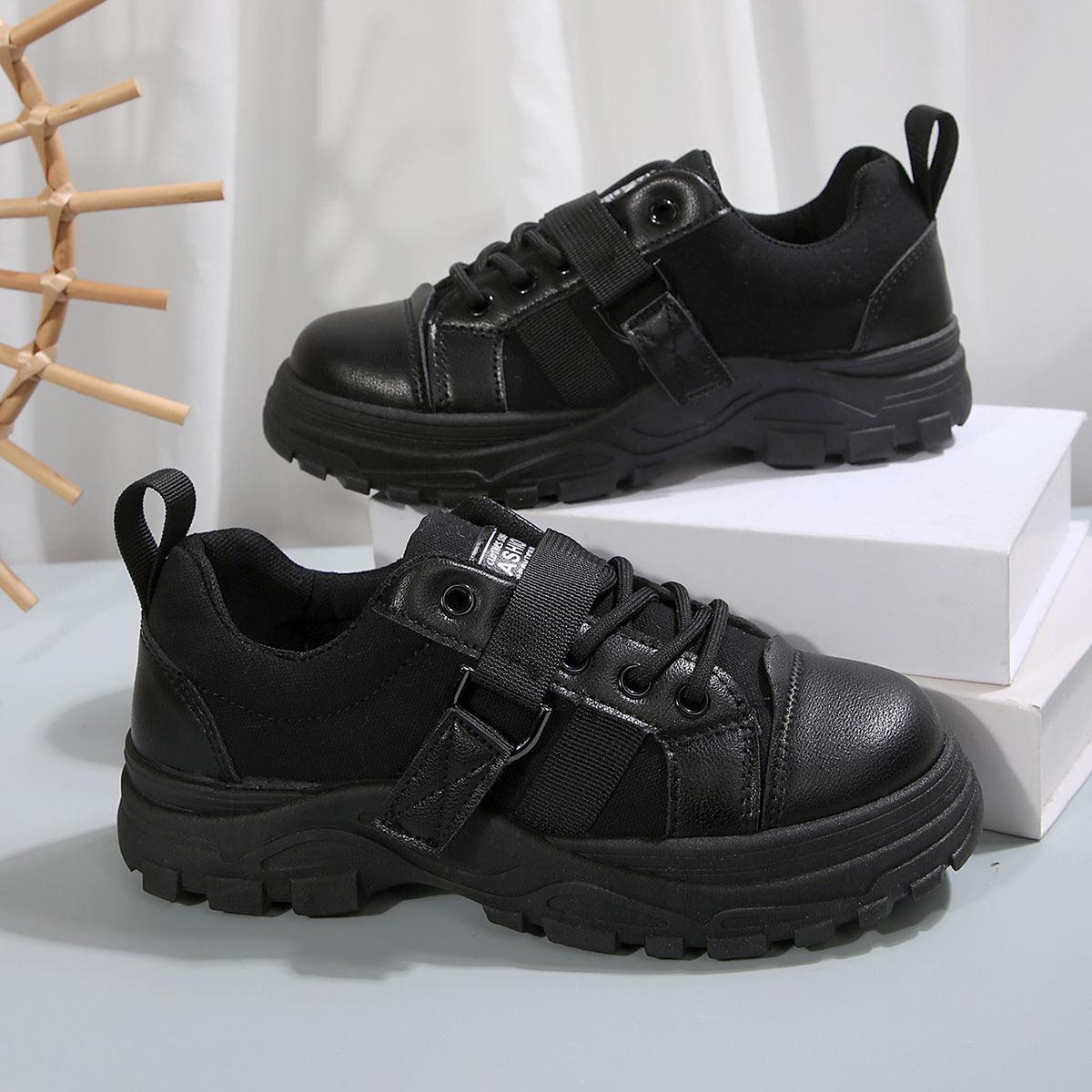 Women's black lace-up sneakers with hook strap, chunky sole, and padded upper