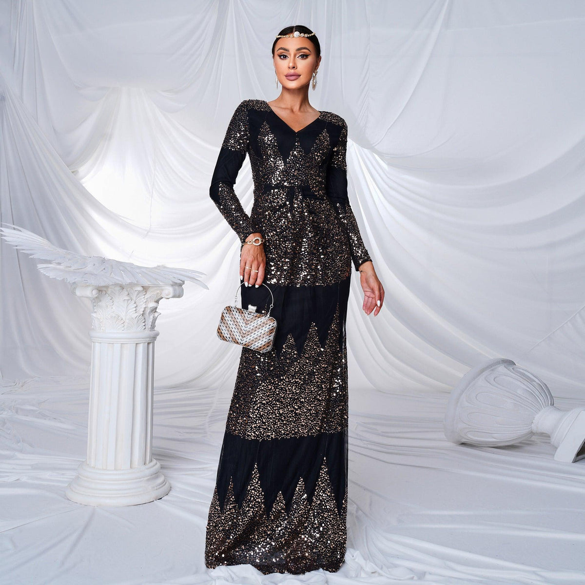 Black sequin V-neck evening dress with long sleeves, fitted waist and floor-length skirt