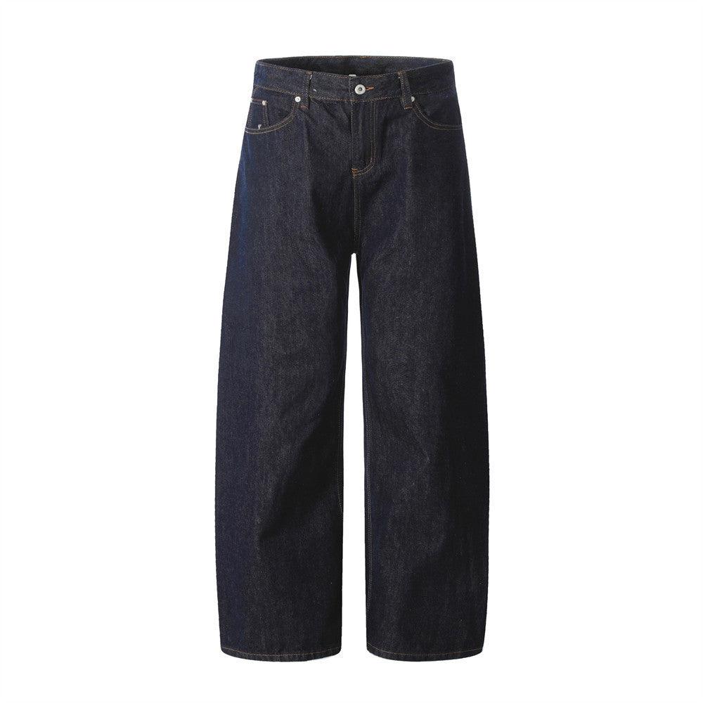 Men's dark denim jeans with button fly and wide straight legs