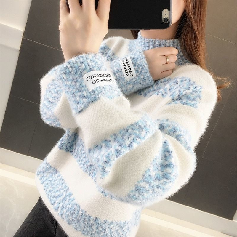 White knitted base-layer top with light blue striped pattern and ribbed cuffs