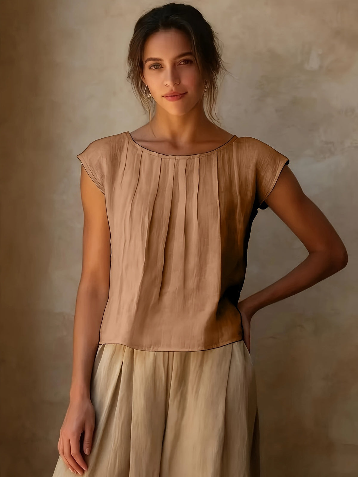 Khaki sleeveless round-neck top with vertical pleats and short cap sleeves