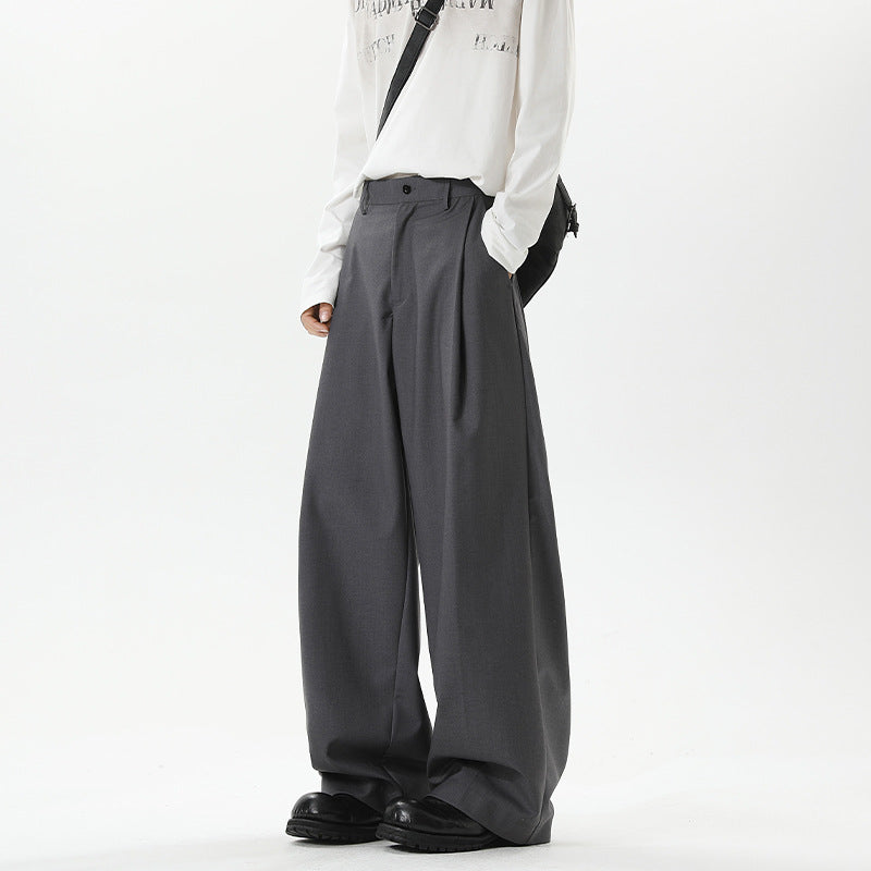Gray high-waist straight-leg suit pants with button closure and belt loops