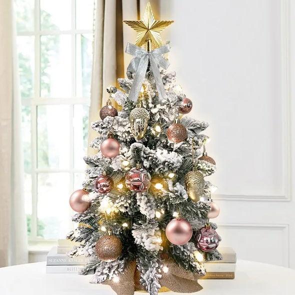 22-inch tabletop Christmas tree with flocked branches, gold star topper, pink and gold ornaments
