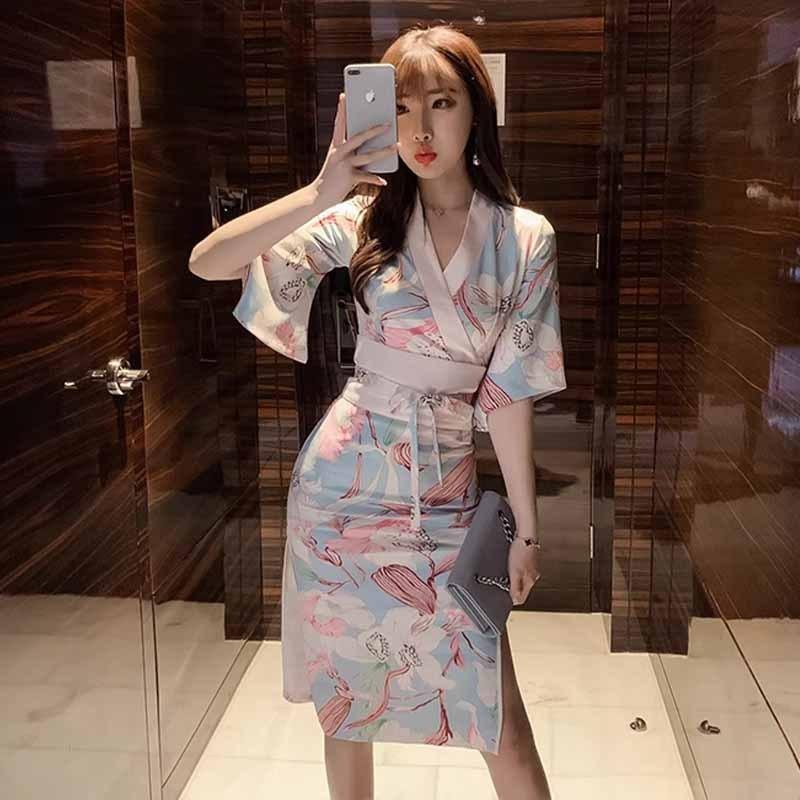 Pastel floral hanfu dress with V-neck wrap, short sleeves, and tied waist belt