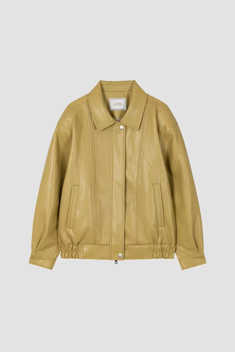 Ginger-yellow leather jacket with turn-down collar, front zipper, and side pockets