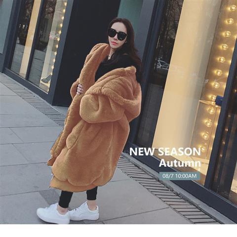 Women’s hooded fur jacket in apricot tan, oversized puffy style with plush fleece look