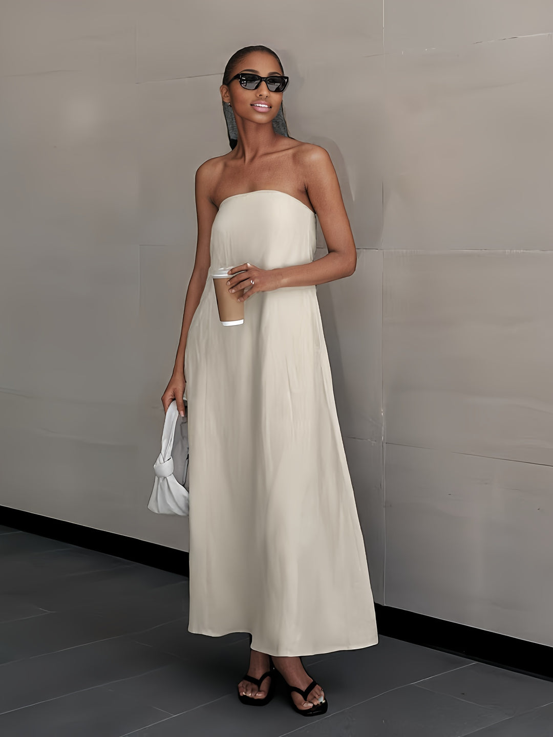 Ivory strapless midi dress with smocked bodice and smooth flowing skirt