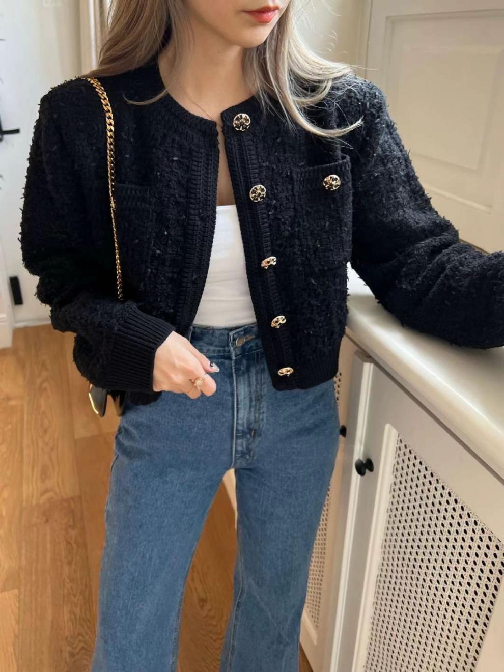 Women’s knitted round-neck cardigan in black with button-front placket and long sleeves
