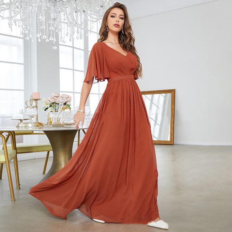 Brick red chiffon V-neck maxi dress with draped skirt, flutter half sleeves, gathered waist