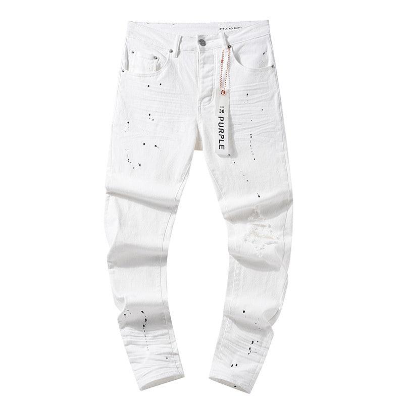 White washed straight jeans with distressed holes and patch details, button fly