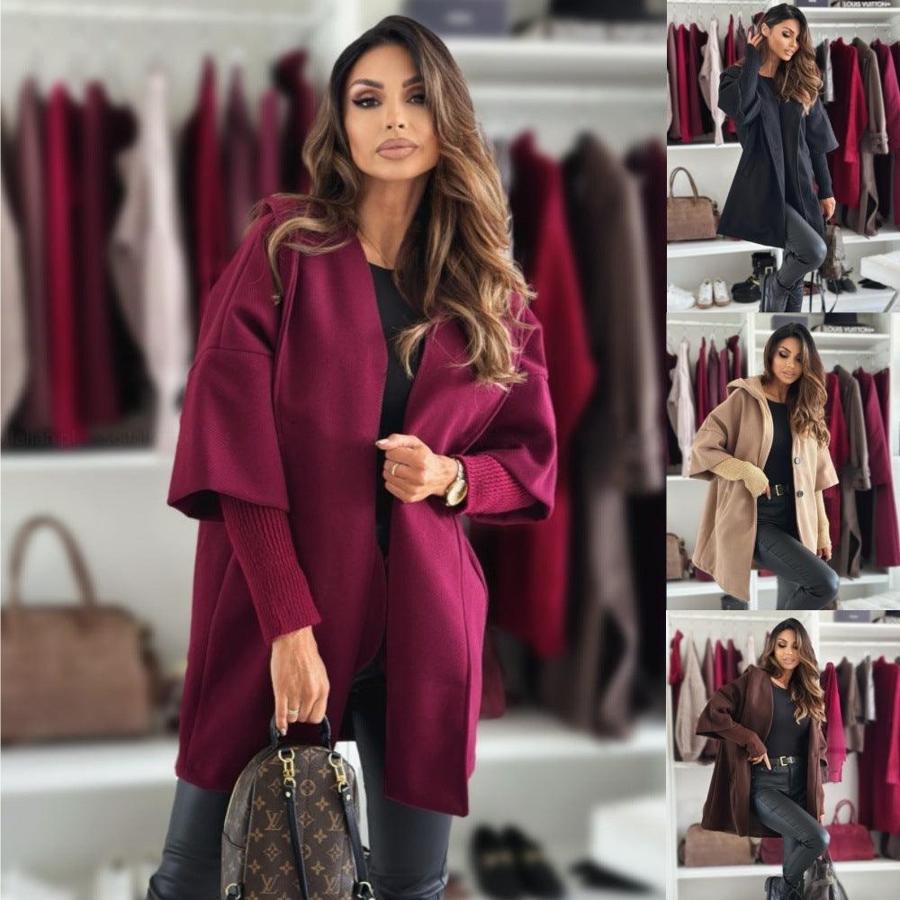 Loose hooded wool coat in wine red with long sleeves and button front