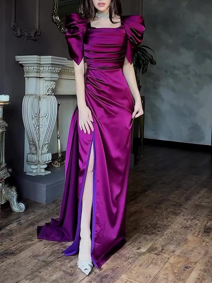 Fuchsia satin maxi dress with puff sleeves, fitted bodice, and front slit