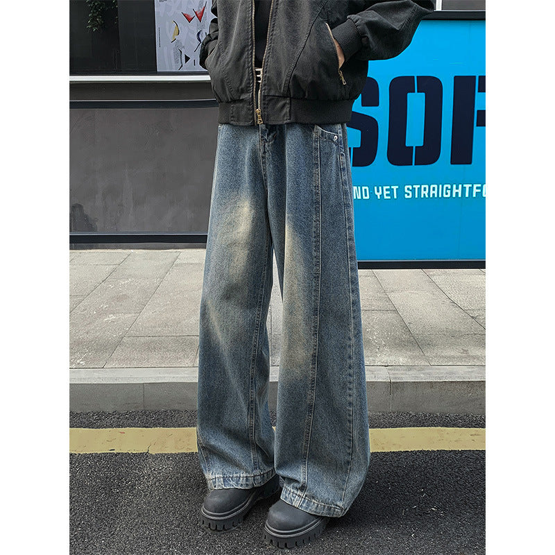 Men's medium blue bootcut jeans with front button and wide flared legs