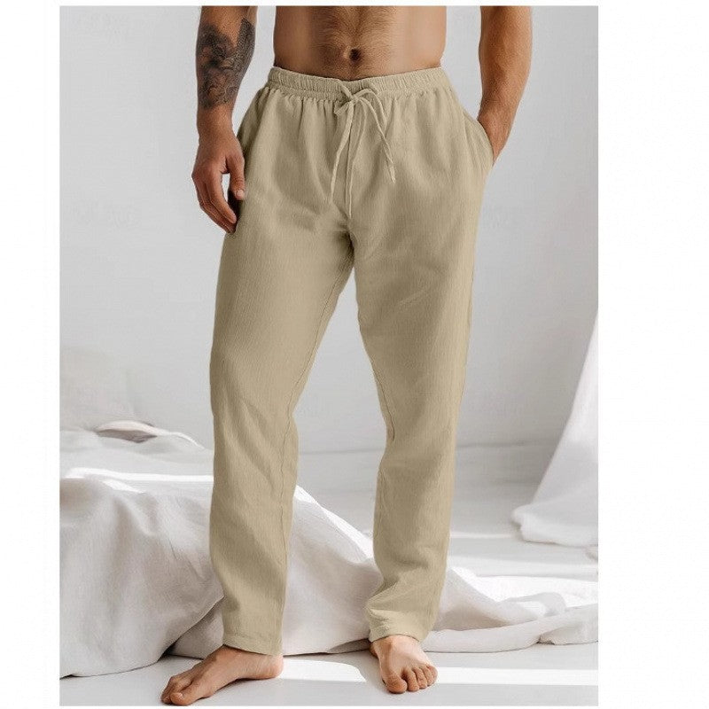 Men's loose straight-leg trousers in light khaki with elastic waist drawstring