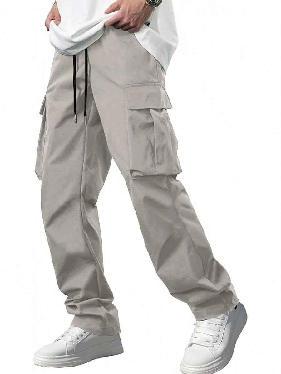 Men's light gray cargo pants with drawstring waist and side flap cargo pockets, relaxed fit