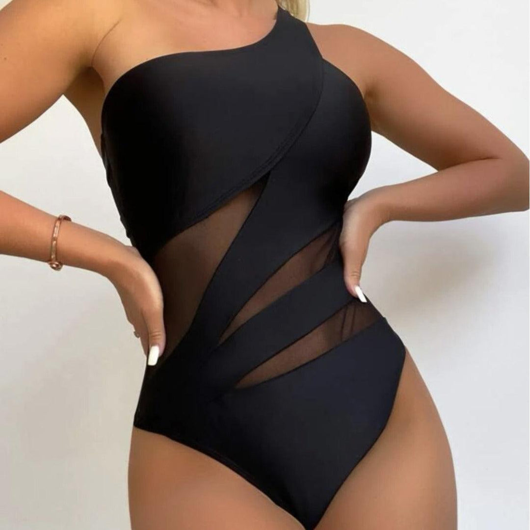 Black one-piece swimsuit with one-shoulder design and mesh cutout panel