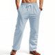 Light blue linen beach shorts, side view, drawstring waist and straight legs