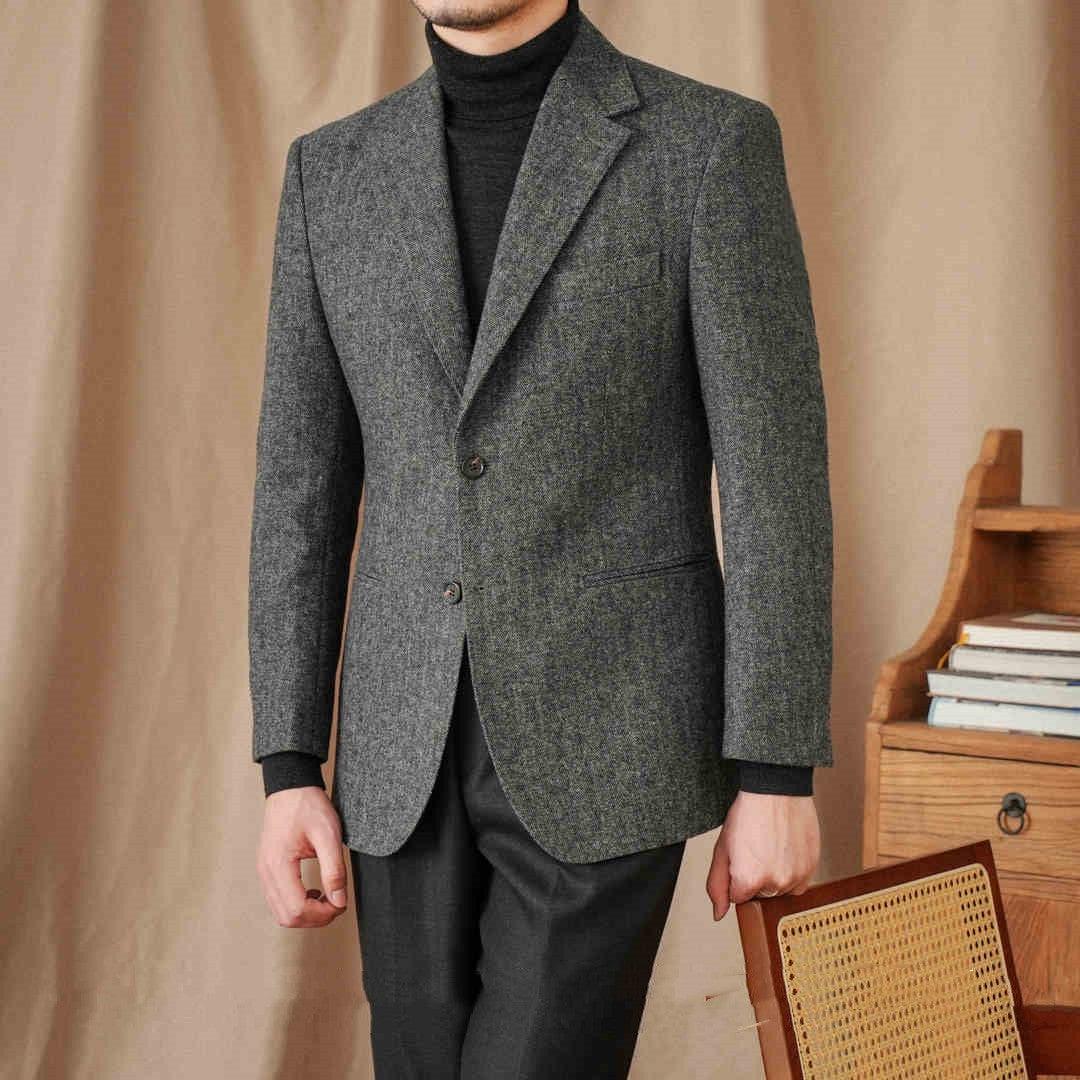 Gray men’s warm suit jacket and matching dark trousers, single-breasted with notch lapels