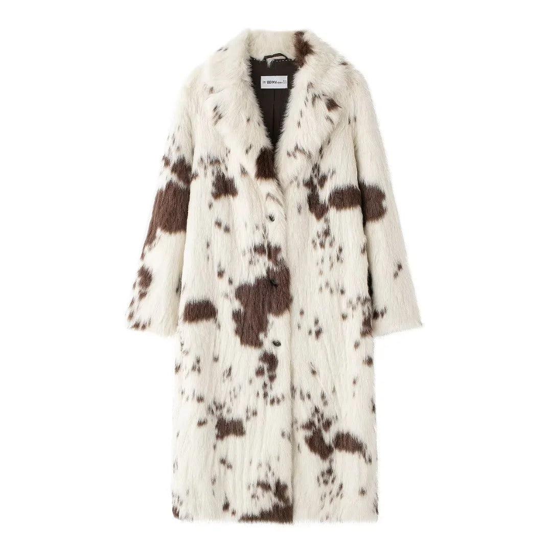 Women's faux fur coat front, white with brown cow-print patches and notched collar.