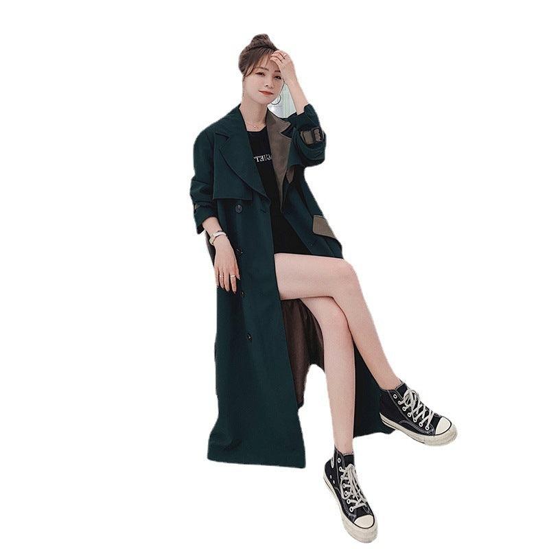 Dark green long coat with notched lapels, double-breasted buttons, belted waist, slit hem