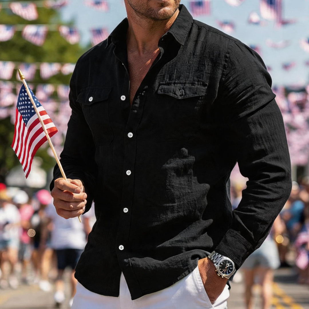 Men's black long-sleeve button-up shirt with two chest pockets and washed texture