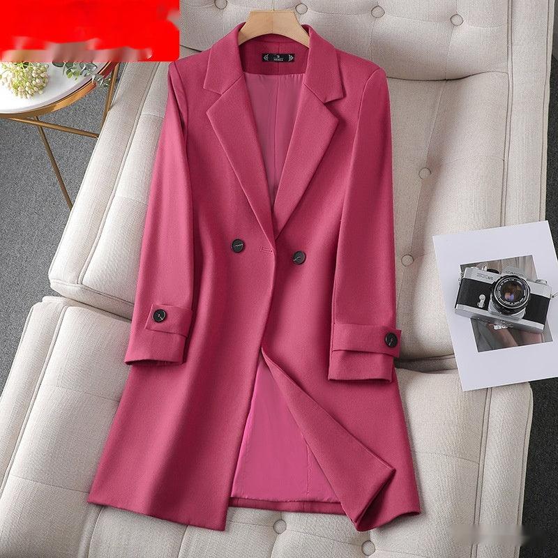 Rose red mid-length trench coat on hanger with double-breasted buttons and suit collar