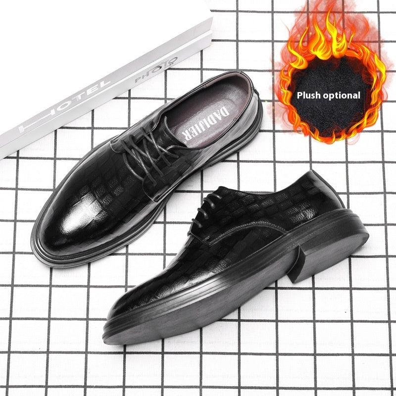 Black leather lace-up casual shoes with textured vamp and thick rubber sole.