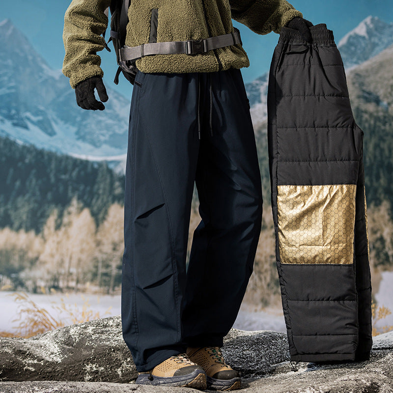 Dark navy insulated work pants with drawstring waist, side pockets, and tapered legs