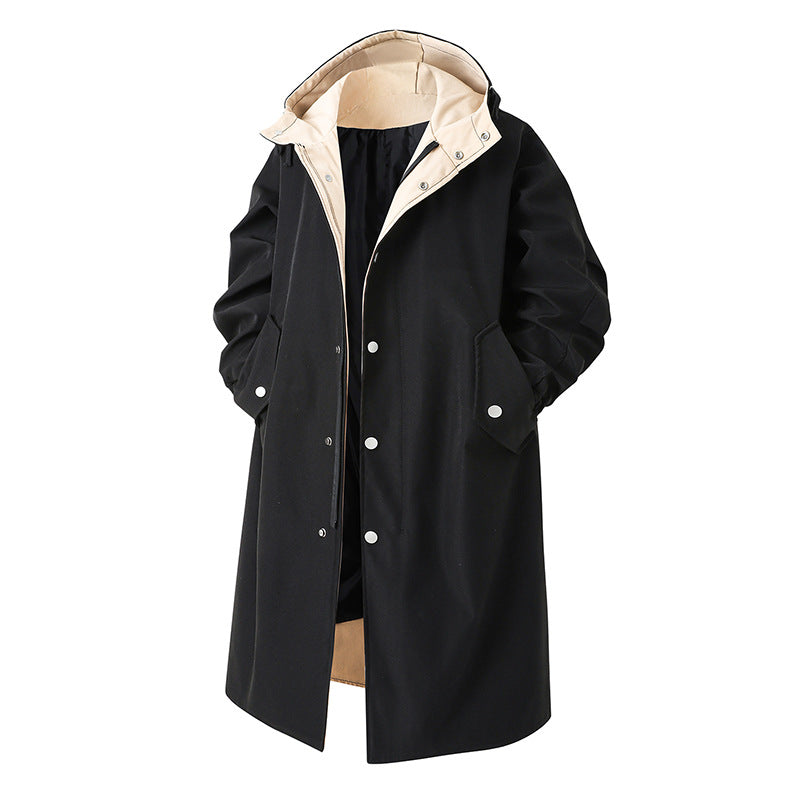 Men's mid-length trench coat in black with hood, buttoned front, and chest pockets.