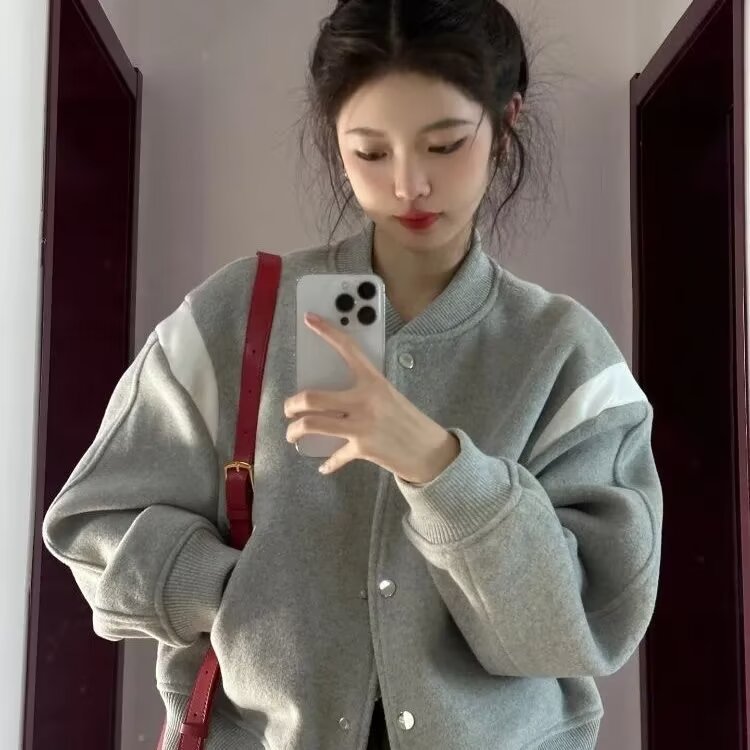Women’s gray button-front top jacket with ribbed stand collar and long sleeves