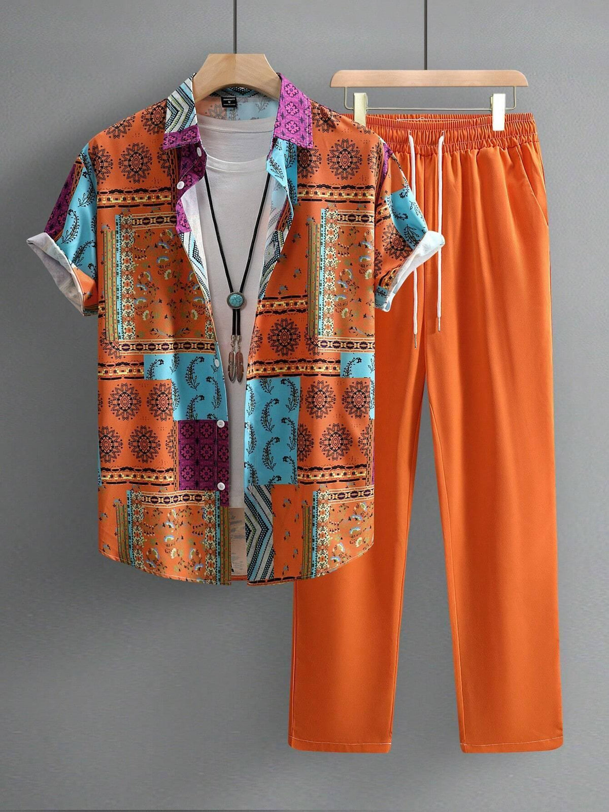 Casual printed short-sleeve shirt and orange drawstring trousers set, bold orange and teal pattern