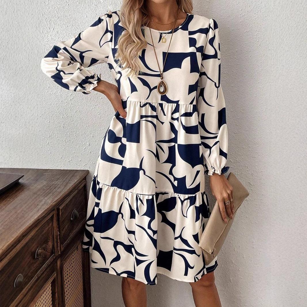 Navy/white printed long-sleeve dress, round neck, ruched bodice, tiered hem