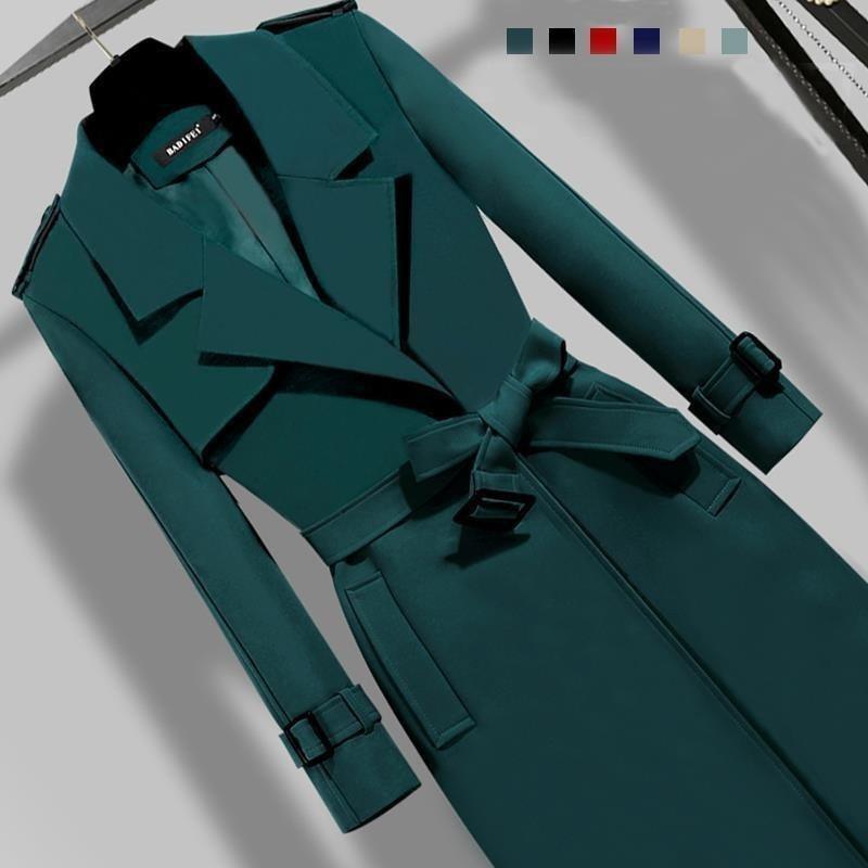 Dark teal long coat with notch lapels, belt tie, and cuff straps