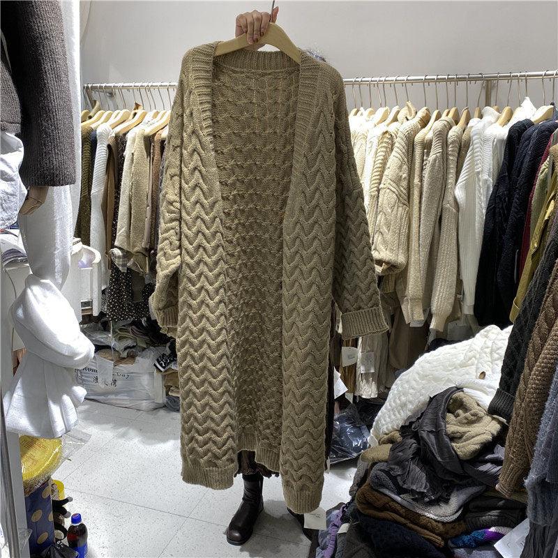 Long thick knitted cardigan in olive with chevron cable knit texture and button front