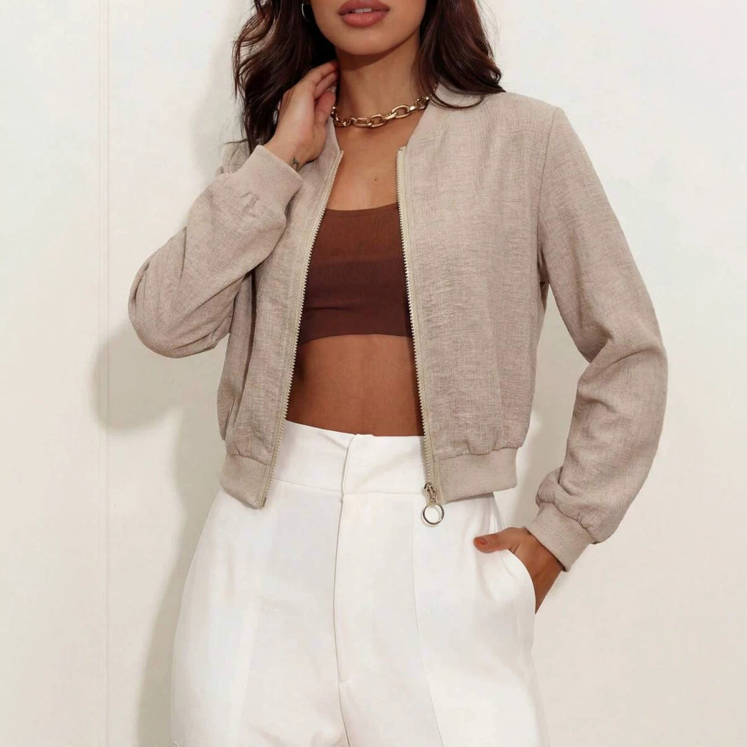 Beige short zip-up jacket with long sleeves and front zipper