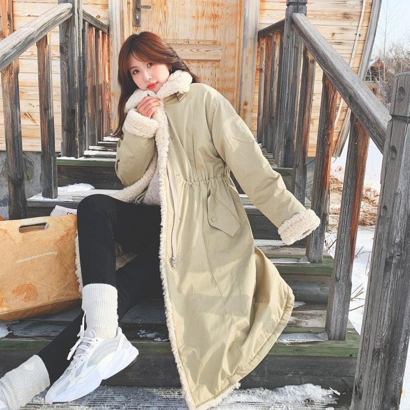Khaki cotton coat with rabbit-fur lining, hood trim, button front, and drawstring waist