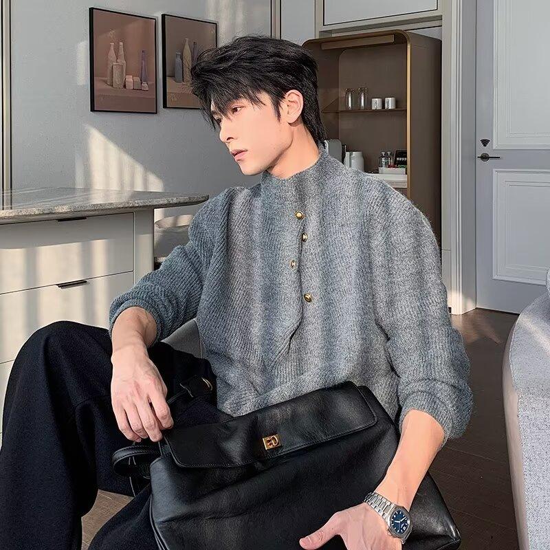 Men's gray knit sweater with stand collar and brass button placket