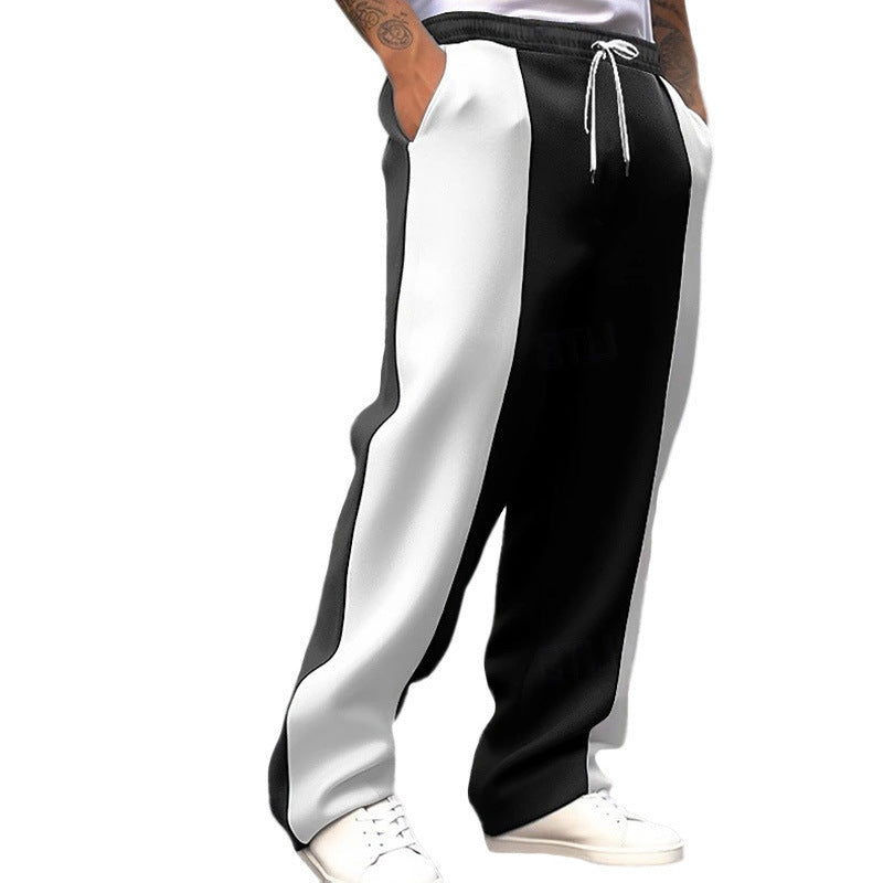 Men's black and light side-panel track trousers with elastic drawstring waist.