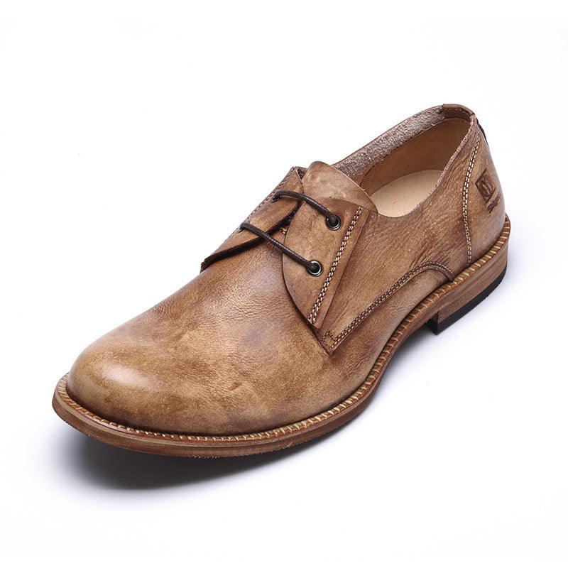 Brown lace-up dress shoes with metal eyelets and stitched seams, front angle