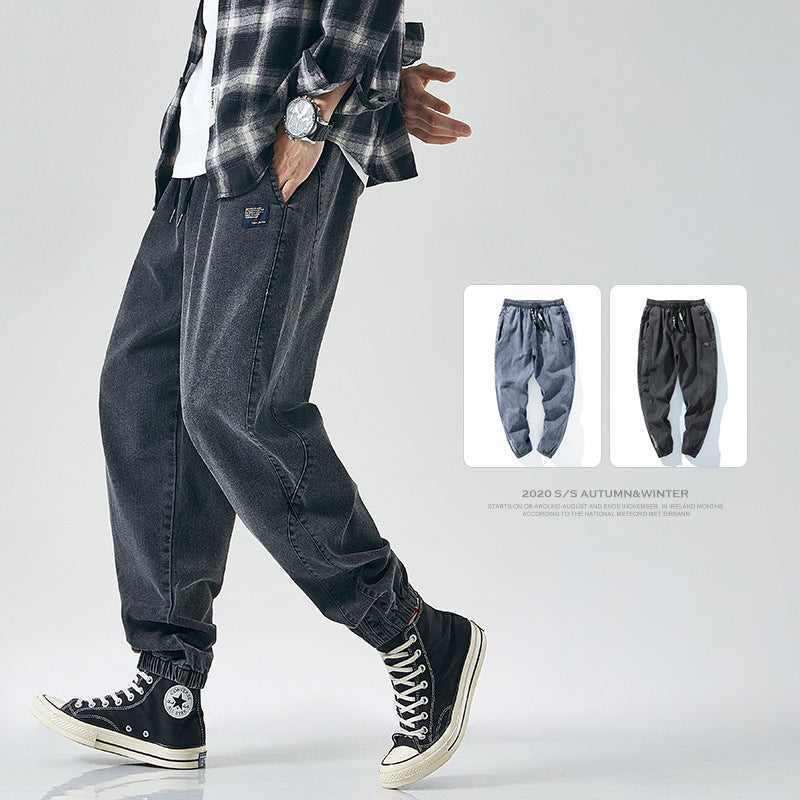 Black loose-fit cargo pants with elastic cuffs and side pockets