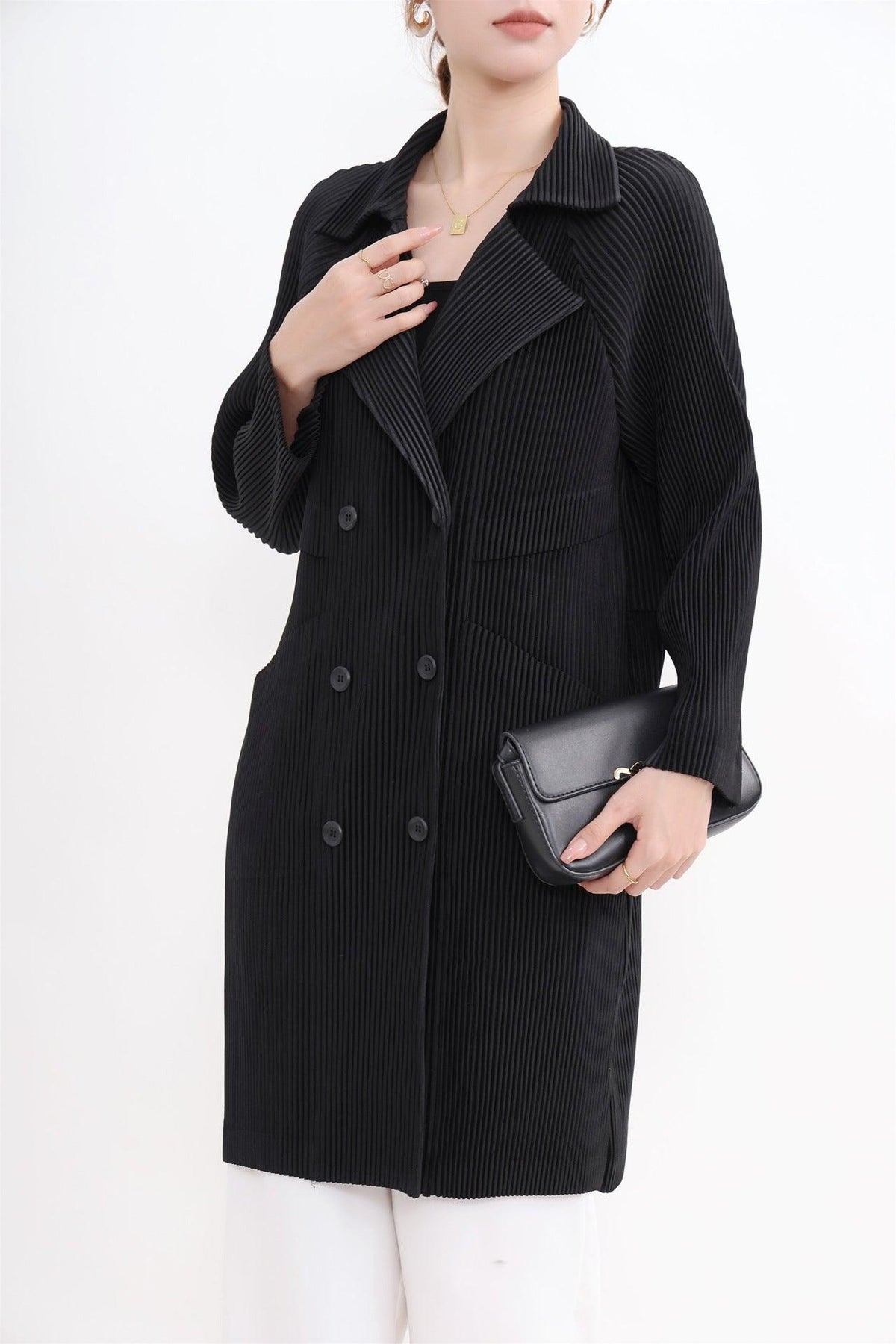Women’s mid-length striped suit coat in black, double-breasted buttons, notched lapel, long sleeves.