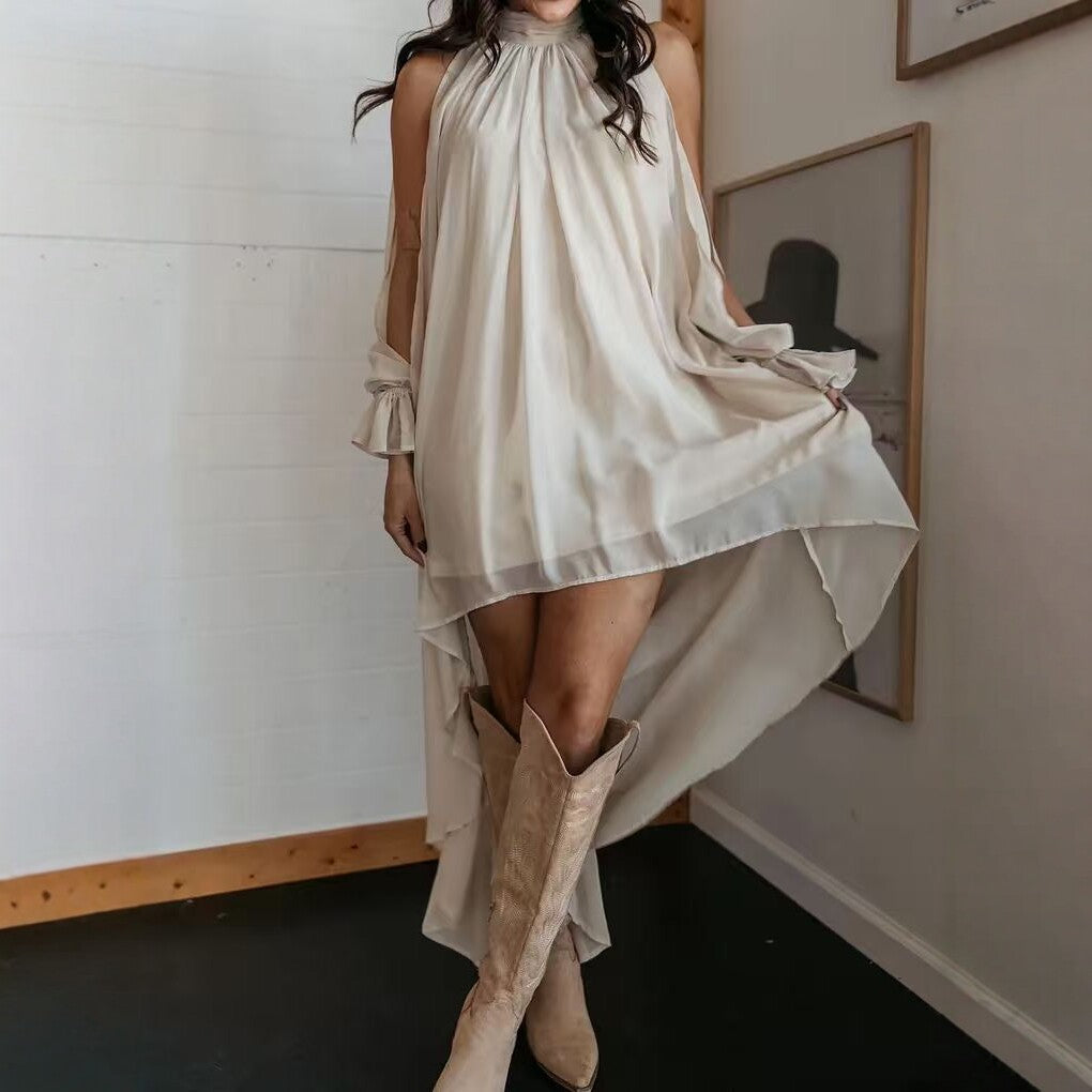 Beige high-neck chiffon dress with draped sleeves and irregular layered hem.