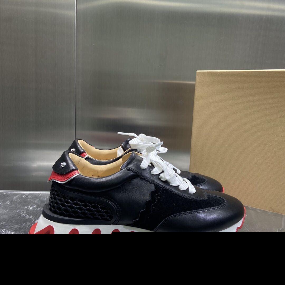 Women's low-top sneakers, black upper with textured side and red zigzag thick sole
