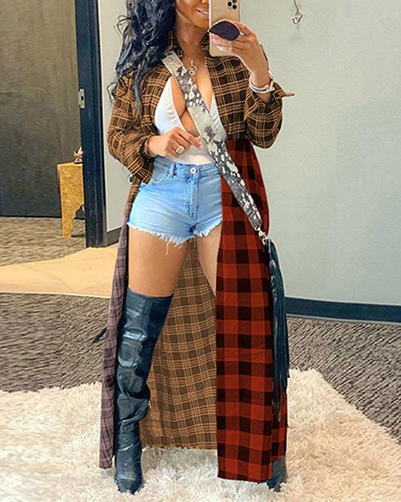 Long open-front plaid coat with fringed hem, brown and rust check pattern.