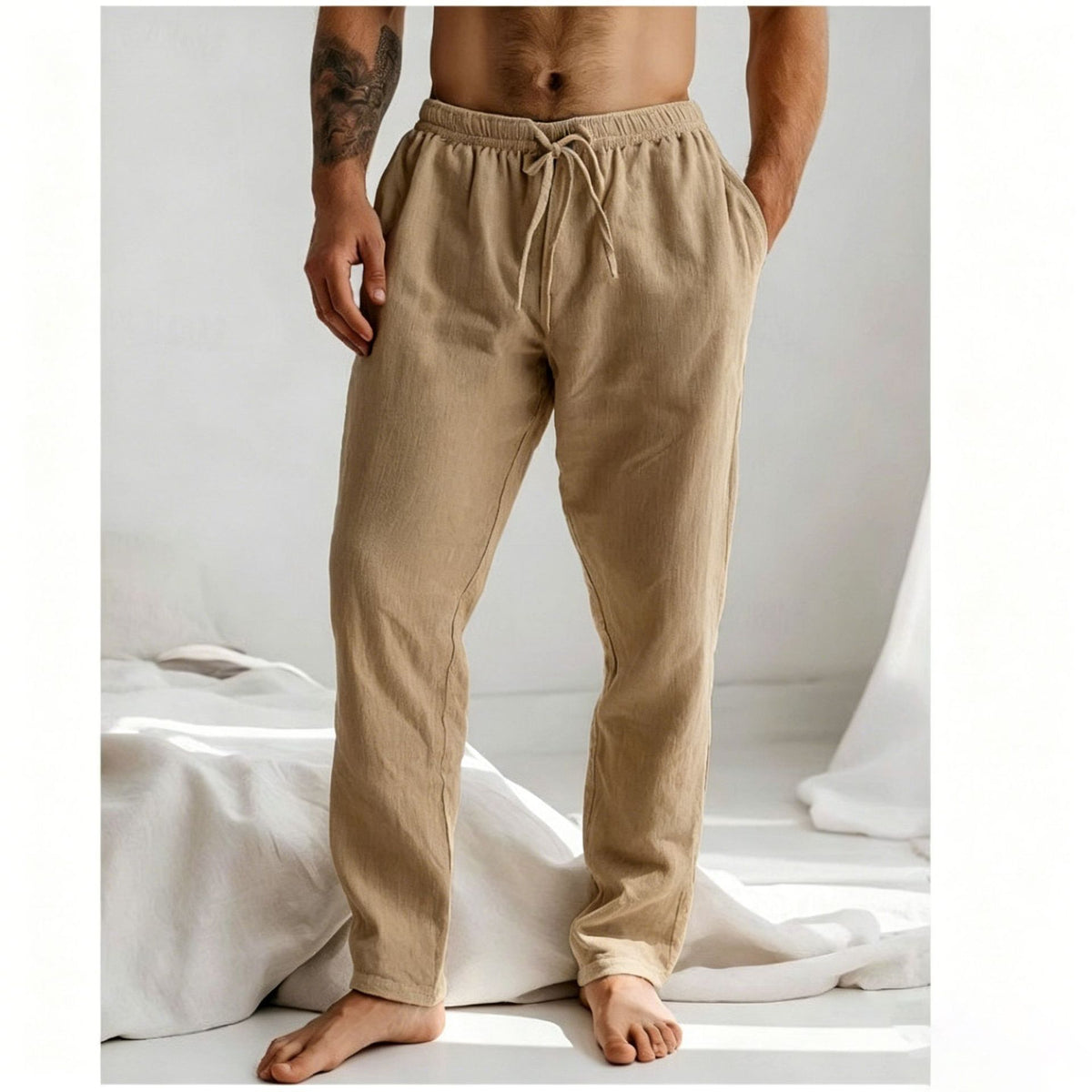 Men's loose straight-leg trousers in light khaki with elastic drawstring waist